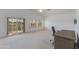 Spacious bedroom with desk and sliding doors to the outside at 1331 E Voltaire Ave, Phoenix, AZ 85022