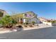 Charming two-story home with a three-car garage and beautiful desert landscaping in a quiet neighborhood at 1331 E Voltaire Ave, Phoenix, AZ 85022