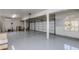 An oversized garage with three car capacity and windows for natural light at 1331 E Voltaire Ave, Phoenix, AZ 85022