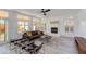 Cozy living room featuring a fireplace, modern furniture, and plenty of natural light at 1331 E Voltaire Ave, Phoenix, AZ 85022