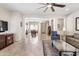 Inviting living room area with a ceiling fan, tile flooring and comfortable furnishings at 14010 N 12Th St, Phoenix, AZ 85022