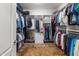 Organized walk-in closet with ample shelving and hanging space at 14010 N 12Th St, Phoenix, AZ 85022