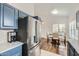 Well-lit kitchen area featuring stainless steel appliances and eat in dining space at 14300 W Bell Rd # 307, Surprise, AZ 85374