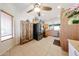 Bright eat-in kitchen featuring stainless steel appliances, tile flooring, and wooden cabinetry at 15561 W Vista Grande Ln, Surprise, AZ 85374
