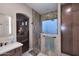 Bathroom featuring large glass shower, double vanity, and modern neutral tones at 17234 E Sunscape Dr, Fountain Hills, AZ 85268