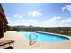 Beautiful pool with views of the valley and mountains beyond at 17234 E Sunscape Dr, Fountain Hills, AZ 85268