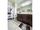 Bathroom featuring a modern vanity and unique shower curtain at 18809 W Wilson St, Buckeye, AZ 85326