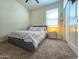 Cozy bedroom with a comfortable bed and warm, inviting decor at 18809 W Wilson St, Buckeye, AZ 85326