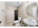 Stylish half-bath featuring modern fixtures, neutral tones and ample space for guests at 1928 E 39Th Ave, Apache Junction, AZ 85119