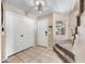 Spacious foyer with tiled floor, a coat closet, and stairs leading to the upper level at 1928 E 39Th Ave, Apache Junction, AZ 85119