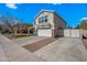 This home includes stone accents, a two-car garage and a well-maintained front yard at 1928 E 39Th Ave, Apache Junction, AZ 85119