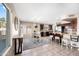 Bright kitchen with a center island and breakfast bar, seamlessly connected to the dining area at 1928 E 39Th Ave, Apache Junction, AZ 85119