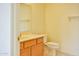 Bathroom featuring tile flooring, wood vanity, toilet and large mirror at 19348 W Brave Rd, Buckeye, AZ 85326