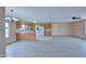 Spacious open-concept layout with a combined living room, dining area, and kitchen at 19348 W Brave Rd, Buckeye, AZ 85326
