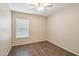 Bedroom featuring wood-look laminate floors and a ceiling fan at 2014 E Anderson Dr, Phoenix, AZ 85022