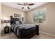 This cozy bedroom boasts a comfortable bed and a serene, relaxing ambiance at 20905 N Danielle Ave, Maricopa, AZ 85138