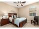 A comfortable bedroom featuring stylish decor and natural light at 20905 N Danielle Ave, Maricopa, AZ 85138