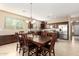 Charming dining area and kitchen with wooden cabinets and stainless steel appliances at 20905 N Danielle Ave, Maricopa, AZ 85138