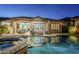 Backyard pool and patio seating enhance this residence's appeal as a relaxing retreat at 2113 N Trowbridge St, Mesa, AZ 85207