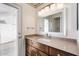 Bathroom vanity with granite countertop, stylish fixtures, and outdoor access through the glass door at 2327 W Rockwell Ct, Chandler, AZ 85224