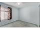 Bedroom with a ceiling fan and natural light streaming through the window at 2327 W Rockwell Ct, Chandler, AZ 85224