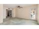 A bedroom with a ceiling fan and a glass door leading to the exterior at 2327 W Rockwell Ct, Chandler, AZ 85224
