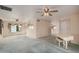 Open living room featuring a white piano and mirrors accenting the wall at 2327 W Rockwell Ct, Chandler, AZ 85224