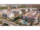 Breathtaking aerial view showcasing the community's picturesque lake, pool area, and lush landscaping at 2511 W Queen Creek Rd # 479, Chandler, AZ 85248