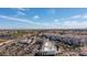 Scenic aerial view of a multi-Gathering residential area with lush landscaping and clear blue skies at 2511 W Queen Creek Rd # 479, Chandler, AZ 85248