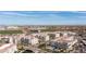 Community aerial view featuring a water feature, pool, and lush greenery, all set against a desert backdrop at 2511 W Queen Creek Rd # 479, Chandler, AZ 85248