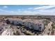Expansive aerial view showcasing the community's well-maintained buildings and scenic surroundings at 2511 W Queen Creek Rd # 479, Chandler, AZ 85248