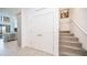 The hallway features a staircase and a view into the kitchen at 2511 W Queen Creek Rd # 479, Chandler, AZ 85248
