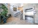 The Cays lobby features an elevator and stairs leading to the upper floors, tile flooring, and plants at 2511 W Queen Creek Rd # 479, Chandler, AZ 85248