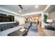 This resident lounge features a large television, comfortable seating, and a dining/meeting space at 2511 W Queen Creek Rd # 479, Chandler, AZ 85248