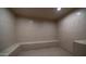 Relaxing sauna room with tiled walls, built-in bench, and tranquil ambiance at 2511 W Queen Creek Rd # 479, Chandler, AZ 85248