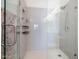 The modern shower showcases gray subway tile, built-in shelves, and a sleek glass door at 2511 W Queen Creek Rd # 479, Chandler, AZ 85248