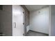 Modern shower area with sleek glass door, tiled walls, and contemporary fixtures at 2511 W Queen Creek Rd # 479, Chandler, AZ 85248