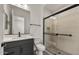 Sleek bathroom with a glass-enclosed shower, modern vanity, and contemporary fixtures for a spa-like experience at 26535 W Mcrae Dr, Buckeye, AZ 85396