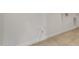 Clean, unfinished utility room with hookups and tile flooring, ready for customization at 26535 W Mcrae Dr, Buckeye, AZ 85396