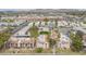 Community aerial view showcasing palm trees, landscape, and surrounding cityscape at 3102 E Clarendon Ave # 210, Phoenix, AZ 85016