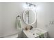 Bathroom featuring modern vanity, illuminated mirror and fresh towels at 3102 E Clarendon Ave # 210, Phoenix, AZ 85016
