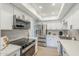 Bright kitchen with stainless steel refrigerator and appliances, white cabinetry, and quartz countertops at 3102 E Clarendon Ave # 210, Phoenix, AZ 85016