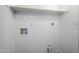 White laundry room with shelf and hookups at 3102 E Clarendon Ave # 210, Phoenix, AZ 85016