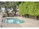 Sparkling community pool surrounded by mature trees offers a refreshing escape at 3102 E Clarendon Ave # 210, Phoenix, AZ 85016