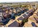 An aerial view of a neighborhood featuring rows of modern homes, showcasing community charm at 335 S Travis --, Mesa, AZ 85208