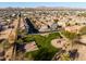 Aerial view of a community park and playground, surrounded by modern homes at 335 S Travis --, Mesa, AZ 85208