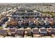 An aerial view showing a community of residences featuring various architectural styles and landscaping at 335 S Travis --, Mesa, AZ 85208