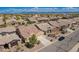Overhead view of a beige home with a tile roof in a neighborhood with mountain views at 346 E Red Mesa Trl, San Tan Valley, AZ 85143
