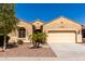 Charming single-story home with a well-maintained front yard and desert landscaping at 346 E Red Mesa Trl, San Tan Valley, AZ 85143