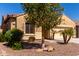 Charming single-story home with a well-maintained front yard and desert landscaping at 346 E Red Mesa Trl, San Tan Valley, AZ 85143